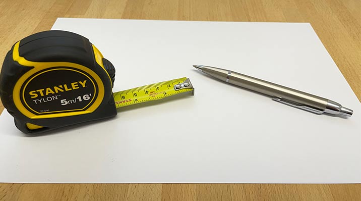 Tape Measure and Pen